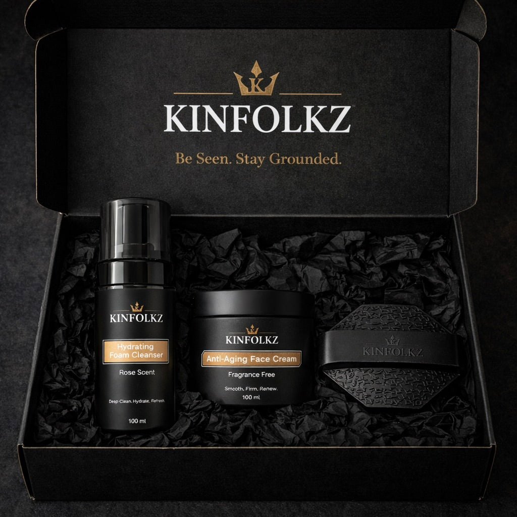 KINFOLKZ Face Ensemble skincare set in black mailer box with cleanser, face cream, and silicone scrubber